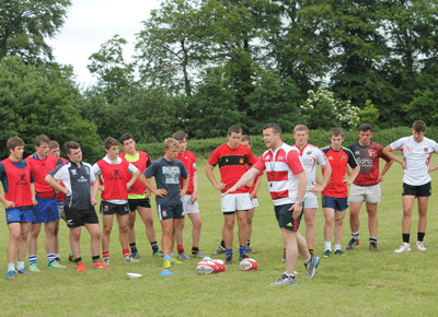 Munster U18 Schools Head Coach Mark Butler puts his squad through their paces